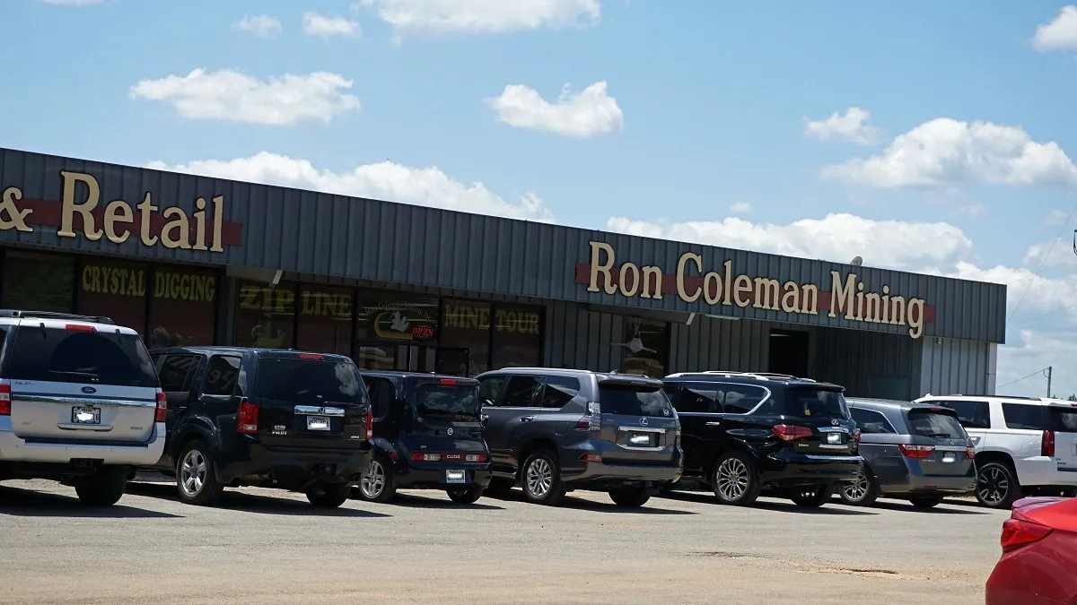Purchase Your Activity Passes At Our Gift Shop - Notice The Large RON COLEMAN MINING Sign