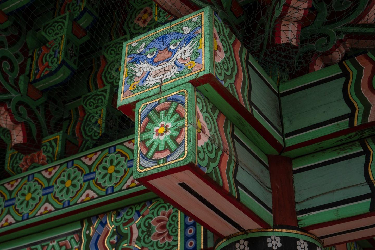 H.U. Lee International Gate and Garden entrance, View of the gate from the garden, The H.U. Lee gate was handcrafted and intricately detailed by South Korean artists.