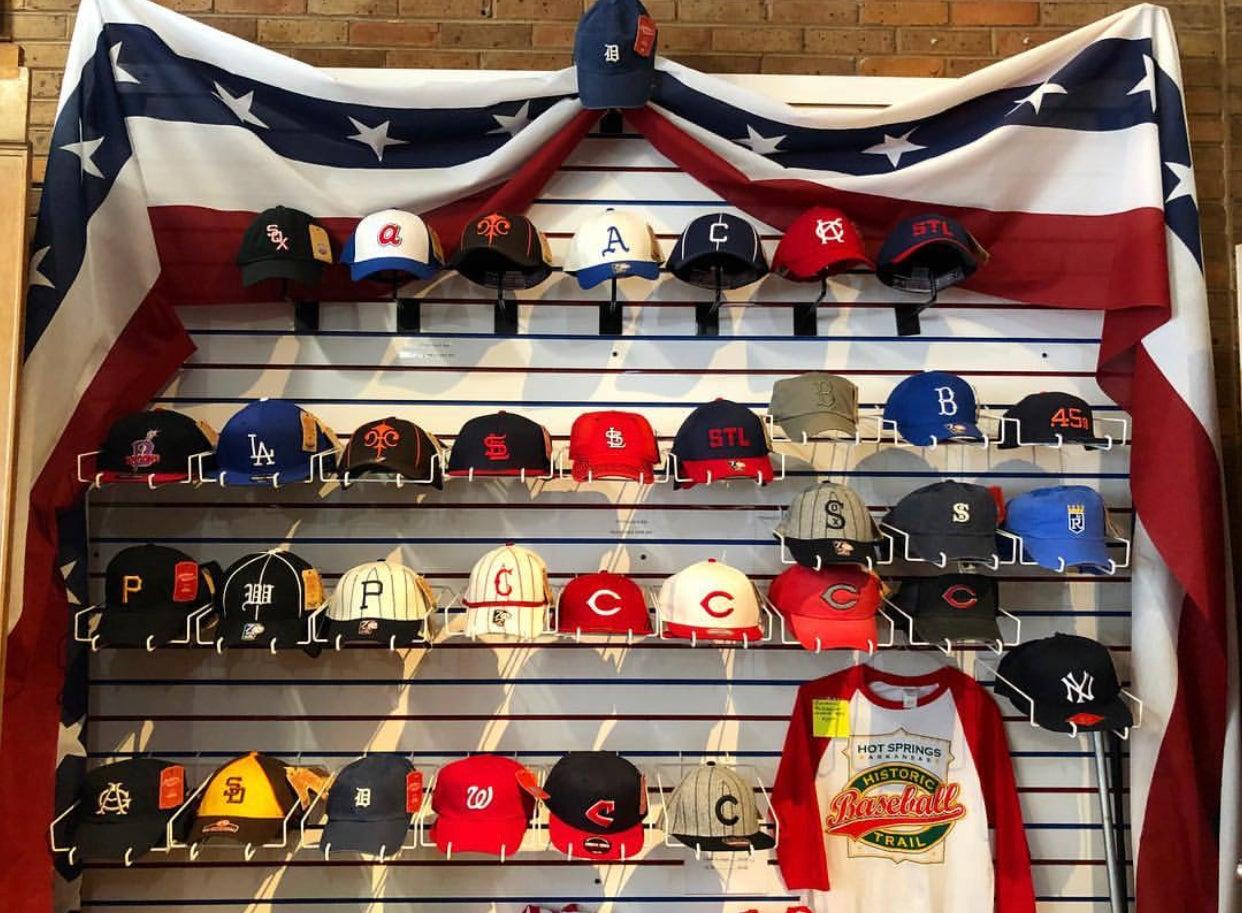 Vintage baseball lids from the “First Boys of Spring” for sale in The Hatterie at TGMOA.