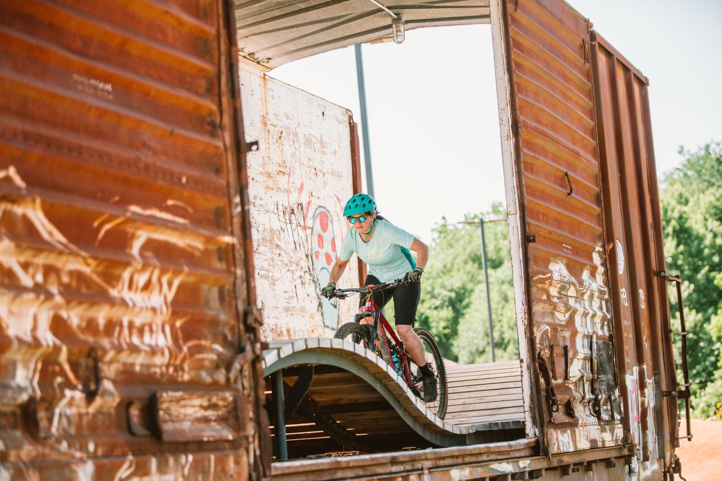 Test your skills riding through the railcar at The Railyard Bike Park in Rogers, Arkansas