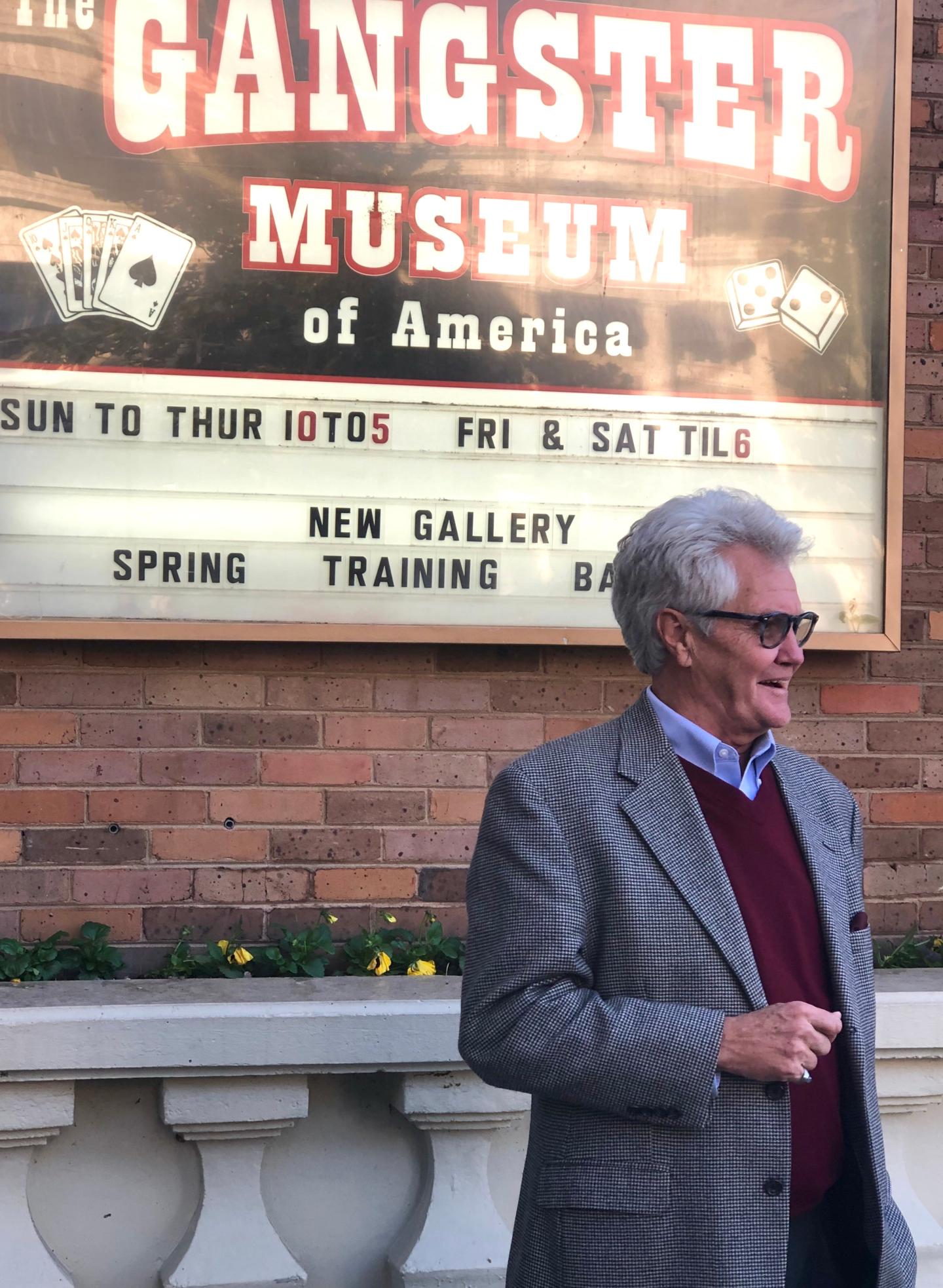Executive director and founder of TGMOA, Robert K. Raines, gives a history lesson to a motor coach tour group on Central Avenue in Hot Springs.