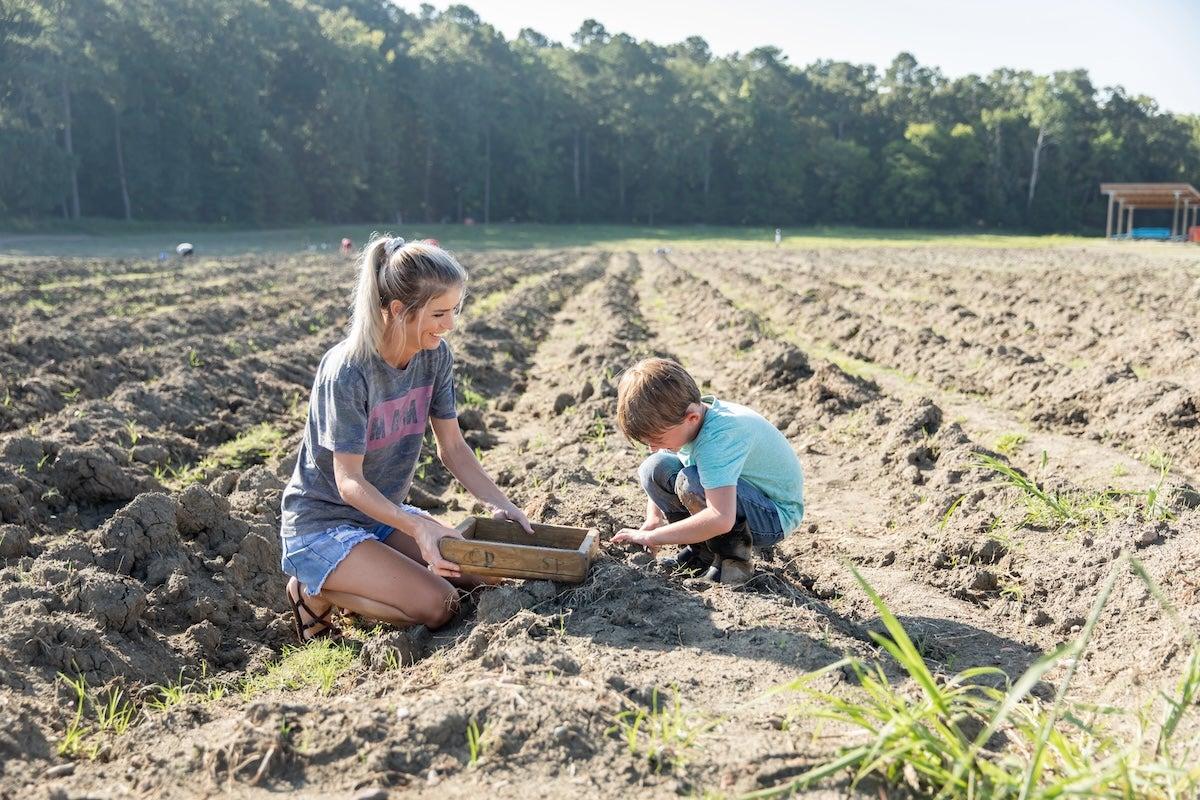 Mon and son digging for diamonds